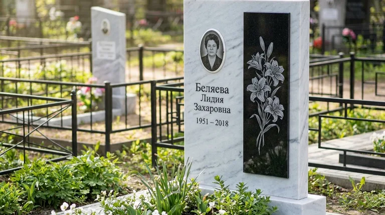 Памятник с гравировкой лилий — выполненная работа «Беляева» в Новокузнецке