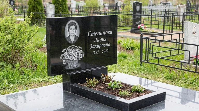 Памятник с гравировкой ромашек — выполненная работа «Степанова» в Новокузнецке
