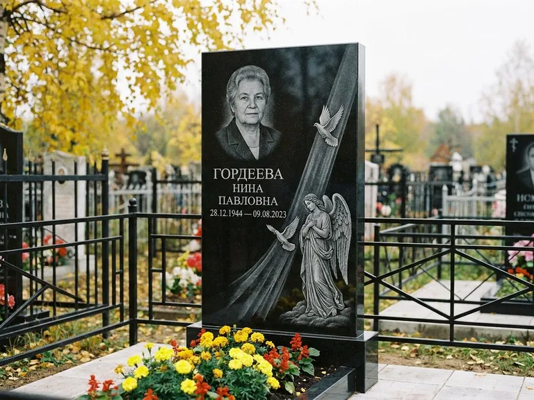Памятник с гравировкой ангела — гравировка ангела с голубем по диагонали стелы, работа «Гордеева» в Новокузнецке